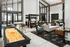 Resident Clubhouse with Shuffleboard at Abberly Commons Apartments in Charlotte, NC