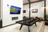 Resident Clubhouse with Pool Table at Abberly Commons Apartments in Charlotte, NC