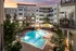 Aerial view of Resort Style Swimming Pool at dusk at Abberly Onyx Apartments in Decatur, GA
