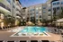 Resort Style Swimming Pool at dusk at Abberly Onyx Apartments in Decatur, GA