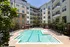 Resort Style Swimming Pool with lounge chairs at Abberly Onyx Apartments in Decatur, GA
