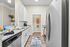 Kitchen with white cabinets at West Ashley Apartments in Charleston, SC