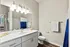 Bathroom with a large vanity at West Ashley Apartments in Charleston, SC
