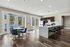 Clubhouse kitchen with bar and eating at West Ashley Apartments in Charleston, SC