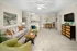Living Room with ceiling fan at Abberly Grove Apartments in Raleigh, NC