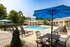 Our apartments showcase an outdoor pool at Abberly Grove Apartments in Raleigh, NC