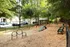Dog park with agility equipment at Abberly Grove Apartments in Raleigh, NC