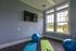 Yoga room with a TV and exercise balls at Abberly Crest Apartments in Lexington Park, MD