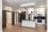 Rolling barn doors with stainless steel hardware at Abberly Skye Apartments in Decatur, GA