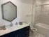 Quartz bathroom countertops and subway tile backsplashes at Abberly Skye Apartments in Decatur, GA
