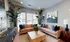 Living room area at Abberly Skye Apartments in Decatur, GA