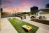 Rooftop Patio with Cornhole Boards at Abberly Skye Apartments in Decatur, GA