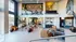 Large double height entry lobby with television and lounge area at Abberly Skye Apartments in Decatur, GA