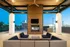 Outdoor Fireplace and Mounted TV on Rooftop at Abberly Skye Apartments in Decatur, GA