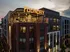 Aerial View of the exterior of the Foundry building at dusk at Abberly Foundry Apartment Homes in Nashville, TN