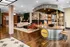 A welcoming reception area featuring a reception desk and comfortable couches at Abberly Foundry Apartment Homes in Nashville, TN