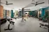 Spacious fitness room featuring exercise equipment and green walls at Abberly Foundry Apartments in Nashville, TN