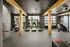 A spacious fitness room with cardio machines, weights, and modern exercise equipment at Abberly Riverwalk Apartments in Nashville, TN