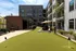A putting green with lush surroundings and modern amenities at Abberly Riverwalk Apartments in Nashville, TN