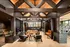 Resident amenity area featuring a room filled with stylish furniture and a large window at Abberly Riverwalk Apartments in Nashville, TN