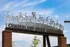 A sign for the Cumberland River Greenway with bikes on top of it at Abberly Riverwalk Apartments in Nashville, TN