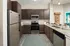 Modern Refrigerator and Kitchen Appliances at Abberly Solaire Apartments in Garner, NC