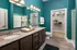 Bathroom With Ample Storage at Abberly Solaire Apartments in Garner, NC