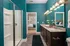 Modern Bathrooms with Granite Counters at Abberly Solaire Apartments in Garner, NC