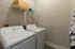 Washer And Dryer in Unit at Abberly Solaire Apartments in Garner, NC
