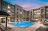 Picturesque Pool and Cabana Setting at Abberly Solaire Apartments in Garner, NC