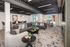 Modern and inviting living room with stylish decor, L-shaped sectional sofa, elegant cushions, sleek coffee table, and ample natural light.