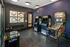 Vibrant game room with classic arcade cabinets and pinball machine, perfect for entertainment and relaxation.