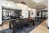 Modern and inviting recreation area featuring a sleek pool table, plush seating, and stylish lighting, perfect for social gatherings.