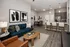 Modern open-concept apartment with elegant living area, stylish kitchen island with bar seating, and contemporary decor.