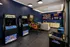 Chic entertainment lounge featuring vintage arcade games, plush seating, and vibrant decor for ultimate relaxation.