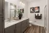 Bathroom with slate vanity cabinets and walk-in shower at Abberly Commons in Charlotte, NC.