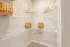 Walk-in closet with ample storage space at Abberly Commons in Charlotte, NC.