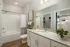 Bathroom vanity with granite countertops at Abberly Commons in Charlotte, NC.