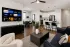 Kitchen island overlooking living and dining areas at Abberly Commons in Charlotte, NC.