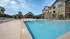 Poolside cabanas and outdoor seating at Abberly Commons in Charlotte, NC.