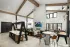 Resident clubhouse with fireplace and seating areas at Abberly Commons in Charlotte, NC.