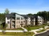 Apartment community exterior with landscaped grounds at Abberly Commons in Charlotte, NC.