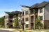 Modern apartment building exterior at Abberly Commons in Charlotte, NC.