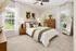 Bright, elegant bedroom with stylish mid-century modern furniture, featuring large windows and tasteful decor.