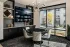 Resident lounge featuring billiards table, floor-to-ceiling windows, and seating areas at Abberly Royal Creek in Raleigh, NC.