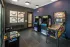 Game room with arcade cabinets and pinball machine at Abberly Royal Creek in Raleigh, NC.