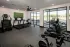 Cardio fitness area with treadmills, bikes, and elliptical machines at Abberly Royal Creek in Raleigh, NC.