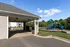 Inviting apartment community with a charming playground and covered picnic area, perfect for families and outdoor relaxation.