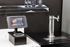 Modern self-serve tap system with a sleek tablet for seamless beverage selection and service.