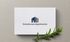 Elegant branding for Stonehouse Apartments featuring a modern architectural logo on textured paper.